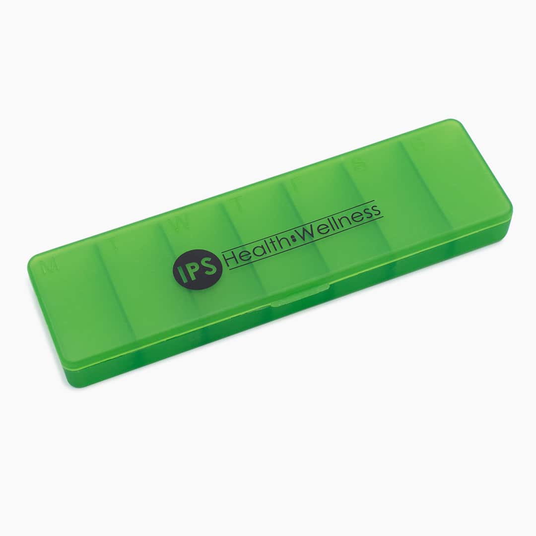 Closed green IPS pill organiser with seven compartments